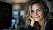 © HQAsset - Smiling Woman with Headset in Office Setting,  Professional Customer Service Agent Working Remotely at Desk.