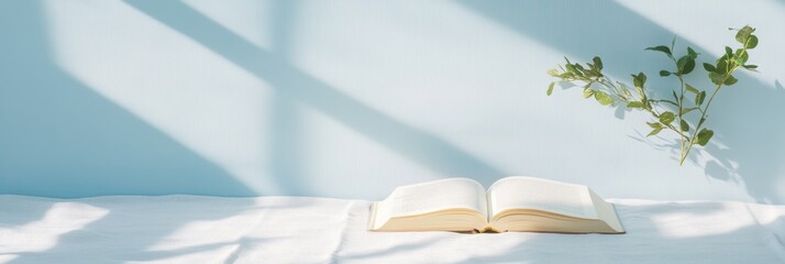 Aufkleber - Minimalist Open Book with Leaf Shadows on Soft Cloth