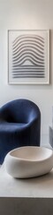 Canvas Print - A modern interior featuring a blue chair, a round bowl, and abstract art.