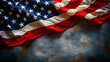 © Tanyastock - American flag on a dark black background.