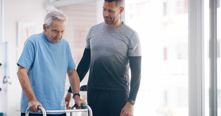 Wall Mural - Physiotherapist, elderly patient and support with walker for mobility, physical activity or progress at clinic. Male person, medical worker or senior with physiotherapy for help or aid at hospital