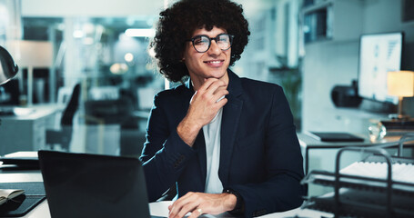 Poster - Night, happy man and thinking in office with glasses, finance management and planning at laptop. Accountant, computer or good idea in agency for audit deadline, tax compliance or vision with research