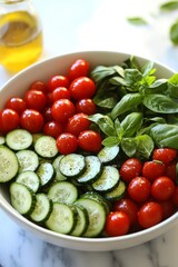 Wall Mural - Fresh Summer Salad with Cherry Tomatoes, Cucumber, and Basil, Close-Up View in White Bowl