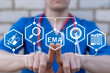 © wladimir1804 - Doctor working on virtual touch screen presses abbreviation: EMA. Concept of EMA European Medicines Agency. Drugs evaluation and quality control, pharmacy medical standards compliance department.