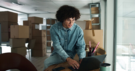 Aufkleber - Man, laptop or typing in office for logistics, order process or package tracking in business. Entrepreneur, tech or smile in warehouse for inventory management, supply chain or boxes for season rush