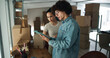 © peopleimages.com - People, tablet and discussion on supply chain industry, inventory check and factory for ecommerce. Employees, update export and support with delivery plan, teamwork and boxes inspection at depot