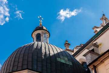 A large dome with a cross on top of it