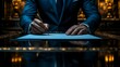 © Munlika - A close-up shot of a businessman signing a contract with a pen on a table, sealing an investment agreement and marking a significant moment in the professional deal-making process.