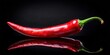 © lapeepon - Aromatic Red Chili Pepper on Black Background, culinary, ingredient,  culinary, ingredient, kitchen