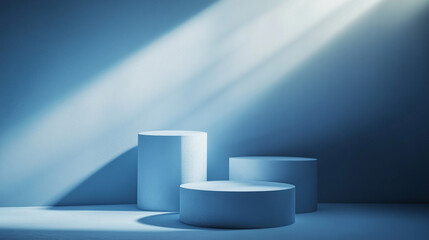 Poster - Minimalist display with three cylinders and dramatic lighting in blue tones. 