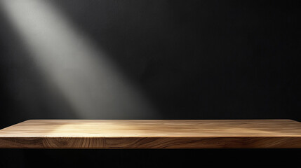 Poster - Wooden tabletop illuminated by soft light against a dark background. 
