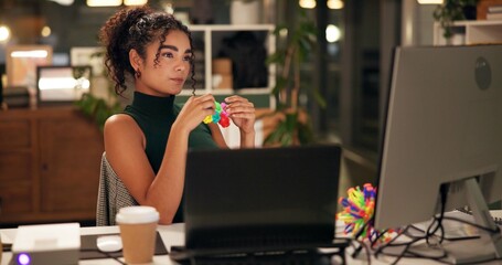 Poster - Business woman, computer and thinking with popit toy, creative agency and ideas for night brainstorming. Girl, brand consultant or multi screen laptop with project, proposal or office fidget stimming