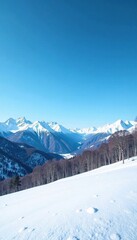 Clear blue sky above a winter landscape with snowcapped mountains and bare trees stretching towards the horizon, sky, snow, horizon