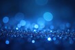© Saksakon - Blue sparkly background with diffused light and optical illusions, optical illusions, defocused lights, surreal effect