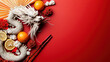 © Not_nutthapong - White dragon with oranges and red decor on red background