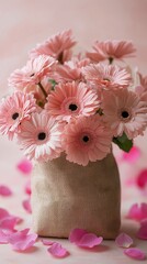 Wall Mural - Beautiful arrangement of pink flowers in a simple bag against a soft background