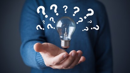 Poster - Businessman Holding Glowing Light Bulb with Question Marks: Creative Thinking, Problem Solving, Innovation, Solution, Idea