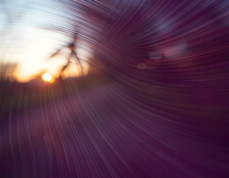Curved lines radiating from the center of the image, creating a sense of depth and movement