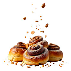 Wall Mural - Cinnamon rolls sprinkled with sugar and cinnamon chips flying around them