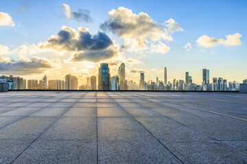 Empty square floor and city skyline with modern buildings scenery at sunrise in Shenzhen, China. Outdoor city background.