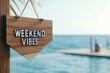 © Дмитрий Прудник - Weekend Vibes by the Ocean: Wooden Sign with Sea View for Relaxation and Leisure