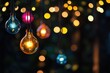© Shahid - Colorful hanging light bulbs in the dark, surrounded by soft, blurred lights in the background