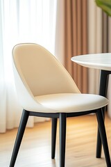 Poster - Elegant Dining Chair Slightly Pulled out From a Sleek, Modern Table in a Bright, Minimalist Space
