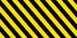 © Khalil - Yellow and black warning diagonal striped background. Editable vector.