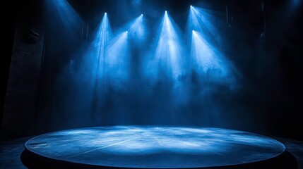 Poster - Empty stage illuminated by spotlights. A circular platform bathed in cool blue light against a dark backdrop. Ideal for presentations or product launches.