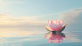 A soft pink lotus floating serenely on still water its petals glowing under gentle morning sunlight.