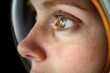 © c80 - Close-up of a person in a space helmet showing focus and determination during a training activity