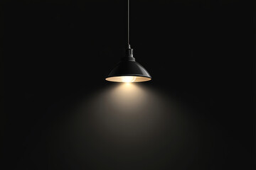 Black pendant lamp with beam of light against black background. Single hanging lamp illuminating dark room