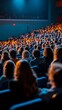 © olegganko - Crowd enjoying a live event at an outdoor amphitheater during sunset