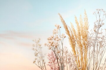  Delicate flowers and grasses against a pastel sky at dusk create a peaceful ambiance in nature's embrace