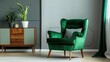 © Zeenat - Emerald green wing back chair with pillow in grey living room interior with wooden commode