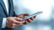 © admin_design - Professional businessman in a modern suit utilizing tablet for digital communication