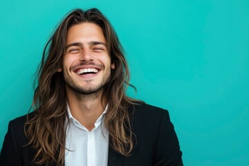 Canvas Print - Young handsome business man with long hair over isolated background looking away to side with smile on face, natural expression. Laughing confident. 