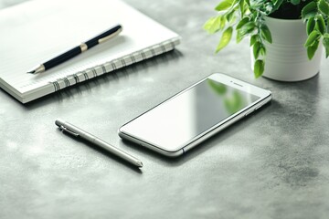 Poster - stock photo of phone on desk with pen and notebook clean workspace for professional