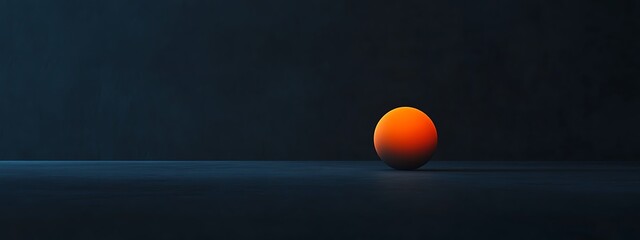 Poster - Orange sphere on dark surface.