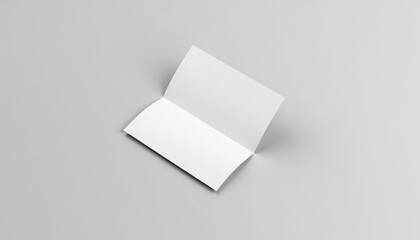 Folded flyer mockup with blank pages on a minimalistic gray background for design concept