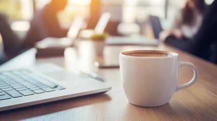 Poster - Modern Business Workspace Featuring a Laptop, Coffee Cup, and Documents on a Desk in a Professional Office Setting with Business Professionals Collaborating in the Background, Ideal for Corporate Them