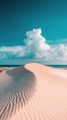 Wall Mural - Golden sand dunes curve gracefully towards the turquoise ocean, where vibrant clouds create an enchanting backdrop on a sunny day