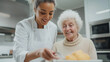 © Bonsales - Occupational therapist helps a smiling senior woman using adaptive kitchen tools, promoting independent living and enhancing quality of life