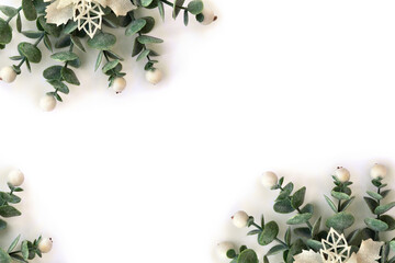 Wall Mural - christmas decoration. flower of white openwork poinsettia, white berries mistletoe on white backgrou