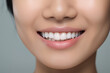 © Mary - Radiant Asian woman with bright smile and perfect teeth, showcasing natural beauty and confidence - Ideal for dental care, health and lifestyle themes. Dentist profession. Asia.