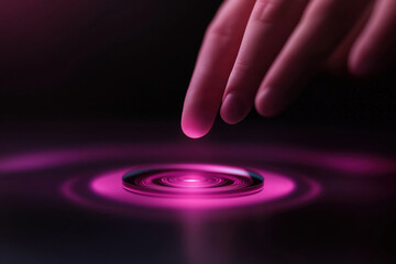 Poster - Creative hand touching a glowing water surface with vibrant pink ripples