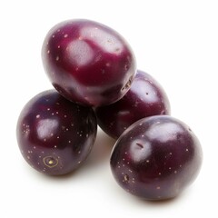 Poster - Four whole, unpeeled purple potatoes, stacked and isolated on a white background, ready for culinary use