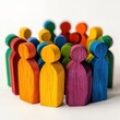 © KHF - Colorful wooden pegs representing economic diversity and inclusion in society visually depict a range of economic roles and opportunities
