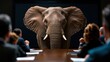 © weerasak - 'The elephant in the room', An elephant in a boardroom symbolizes strong leadership and attention to the big issues in decision making.