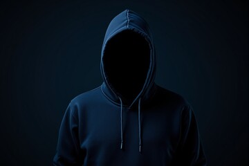 Poster - Anonymous figure in a dark hoodie against a dark background.